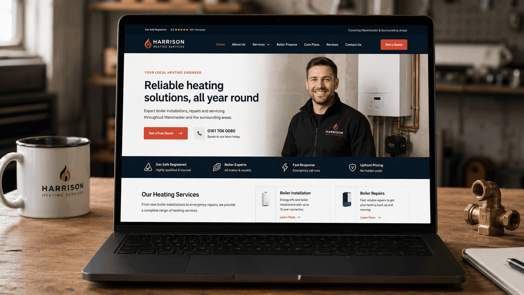A heating engineer's website on a laptop screen, showing the home page with services, coverage area and a marketing video.